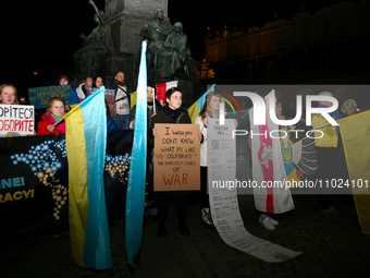 People are organizing a solidarity protest with Ukraine in the Main Square in Krakow, Poland, on February 24, 2024, to mark the second anniv...