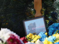 A portrait of serviceman Roman Kornuta (call sign ''Mazepa''), who died in the war with Russia, is being displayed during a farewell ceremon...