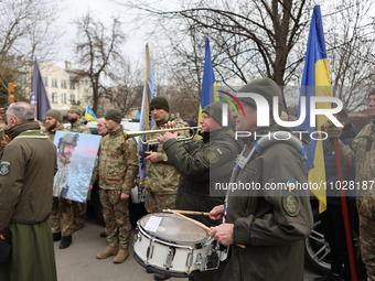 A military orchestra is playing during the funeral of serviceman Roman Kornuta (call sign ''Mazepa''), who died in the war with Russia, in I...