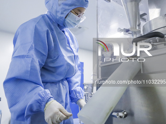 A college student is participating in a pharmaceutical production competition in Huai'an, China, on February 27, 2024. (
