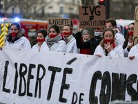 Protestors are taking part in a silent pro-life demonstration in Paris, France, on February 28, 2024, with cloths covering their mouths as t...