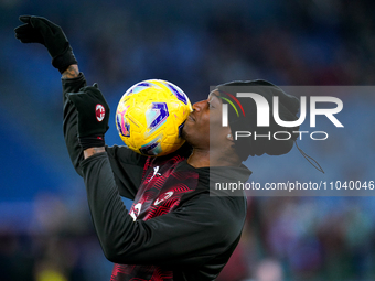 Rafael Leao of AC Milan plays with the ball during the Serie A TIM match between SS Lazio and AC Milan at Stadio Olimpico on March 1, 2024 i...