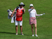 Madelene Sagstrom of Sweden and her caddie are in action during round three of the HSBC Women's World Championship at Sentosa Golf Club in S...