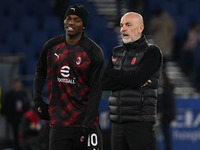 Rafael Leao and Stefano Pioli of A.C. Milan are participating in the 27th day of the Serie A Championship during the match between S.S. Lazi...