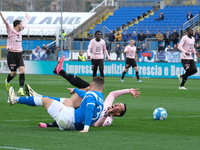 Francesco Di Mariano of Palermo FC is being challenged by Michele Besaggio of Brescia Calcio FC during the Italian Serie B soccer championsh...