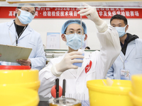 College students are participating in a basic clinical examination competition in Huai'an, Jiangsu Province, China, on March 2, 2024. (