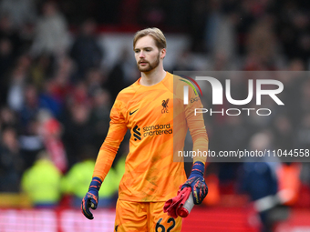 Caoimhin Kelleher of Liverpool is playing during the Premier League match between Nottingham Forest and Liverpool at the City Ground in Nott...