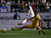 Nikola Krstovic of U.S. Lecce and Simone Romagnoli of Frosinone Calcio are competing during the 27th day of the Serie A Championship between...
