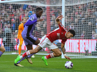 Morgan Gibbs-White of Nottingham Forest is under pressure from Ibrahima Konate of Liverpool during the Premier League match between Nottingh...