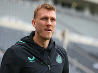 Dan Burn of Newcastle United is playing in the Premier League match against Wolverhampton Wanderers at St. James's Park in Newcastle, on Mar...