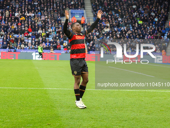 Sinclair Armstrong is celebrating with his teammates after scoring for Queens Park Rangers, extending their lead to 2-0 against Leicester Ci...