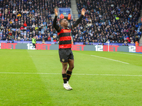 Sinclair Armstrong is celebrating with his teammates after scoring for Queens Park Rangers, extending their lead to 2-0 against Leicester Ci...