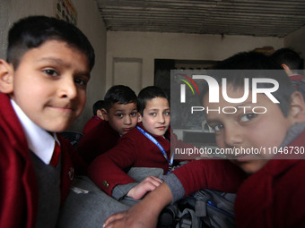 School boys are pictured on the first day of school in Srinagar, India, on March 4, 2024. Schools across Kashmir are reopening after a three...