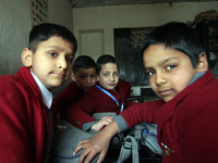 School boys are sitting inside the classroom on the first day in Srinagar, Kashmir, on March 4, 2024. Schools across Kashmir are reopening a...