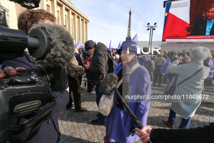 People are gathering near the Eiffel Tower at the Place du Trocadero in Paris, France, on March 4, 2024, as the convocation of both houses o...