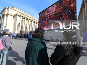 People are gathering near the Eiffel Tower at the Place du Trocadero in Paris, France, on March 4, 2024, as the convocation of both houses o...