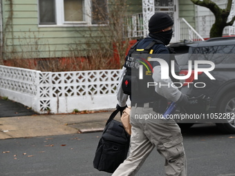 ATF agents are on the scene with evidence bags on Goodwin Avenue in Newark, New Jersey, United States, on March 6, 2024. They are conducting...