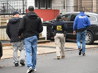 ATF agents are on the scene conducting a court-authorized action in Newark, New Jersey, United States, on March 6, 2024. They are at a resid...