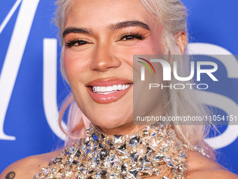 Karol G arrives at the 2024 Billboard Women In Music held at the YouTube Theater at SoFi Stadium on March 6, 2024 in Inglewood, Los Angeles,...