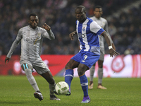 Uniao´s Gian Martins with Porto's Cameroonian forward Vincent Aboubakar during the Premier League 2015/16 match between FC Porto and CF Unia...