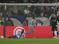 Uniao's Brazilian forward Danilo Dias celebrates after scoring goal and Porto's Spanish goalkeeper Iker Casillas during the Premier League 2...