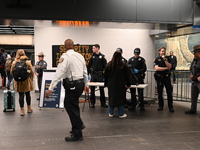 The National Guard, MTA Police, and New York State Police are searching the luggage of subway riders at 34th Street-Penn Station in Manhatta...