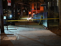 Police are investigating the scene where a 17-year-old boy was fatally shot in the Bronx, New York, United States, on March 7, 2024. The tee...