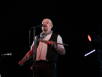 Ian Anderson is playing the flute on stage with his band Jethro Tull at the Coliseu do Porto in Porto, Portugal, on March 7, 2024. (