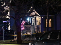Police officers are responding to the scene of a shooting of a fellow officer in Hamilton Township, New Jersey, United States, on March 9, 2...