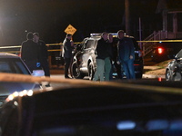 Police officers are responding to the scene of a shooting of a fellow officer in Hamilton Township, New Jersey, United States, on March 9, 2...