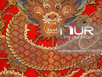 A cultural relic featuring a dragon pattern is being displayed at the Museum in Anhui Province, China, on February 17, 2024. (