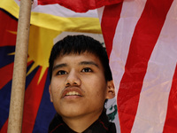  A demonstrator poses during a march through the streets in support of the Tibetan National Uprising Day on March 10,2023 in New York City U...