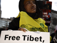 A demonstrator marches through the streets in support of the Tibetan National Uprising Day on March 10,2023 in New York City USA. The march...