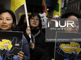 Demonstrators march through the streets in support of the Tibetan National Uprising Day on March 10,2023 in New York City USA. The march I h...