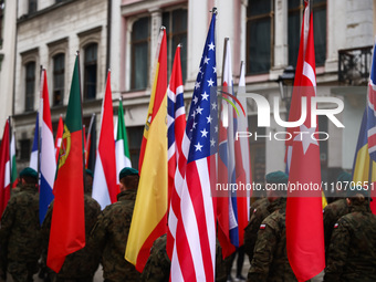NATO flags are seen during official celebration of the 25th anniversary of Poland's accession to the structures of NATO. Krakow, Poland on M...