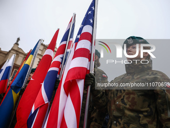 Soldiers of the Polish army are seen ath the Main Square while taking part in official celebration of the 25th anniversary of Poland's acces...