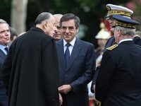 This photograph, taken in Paris, France, on May 8, 2012, shows Admiral Philippe de Gaulle, the son of the general, participating in a ceremo...