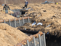 Construction is underway on the second line of fortifications along the border with Russia in the Kharkiv region, northeastern Ukraine, on M...