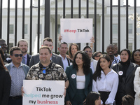TikTok creators are marching from the US Capitol to the White House, demanding that President Biden keep TikTok, during a rally in Washingto...