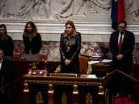 Yael Braun-Pivet, President of the National Assembly, is standing for a minute's silence in the chamber in honor of Admiral Philippe da Gaul...
