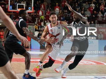 Davide Moretti of Itelyum Varese and Stephens Myles of Nymburk are playing basketball during the FIBA Europe Cup match between Openjobmetis...