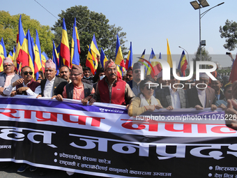 Kamal Thapa (center with red jacket), the former Prime Minister, is leading a demonstration in Kathmandu, Nepal, on March 14, 2024. The demo...