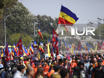 Monarchy supporters are waving Nepal's national flag and the flag of the Rastriya Prajatantra Party-Nepal during a rally organized in Kathma...