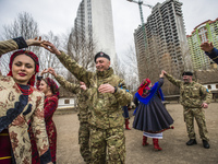 Soldiers of Georgia National Legion (part of Armed Forces of Ukraine) take part in Maslenitsa festivities in Mamayeva Sloboda, Kyiv, Ukraine...