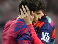 Joao Felix second striker of Barcelona and Portugal and Alvaro Morata centre-forward of Atletico de Madrid and Spain  greets each other prio...