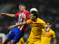 Nahuel Molina right-back of Atletico de Madrid and Argentina and Joao Felix second striker of Barcelona and Portugal compete for the ball du...