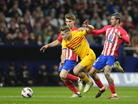 Fermin Lopez attacking midfield of Barcelona and Spain and Rodrigo de Paul central midfield of Atletico de Madrid and Argentina compete for...