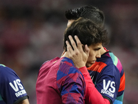 Joao Felix second striker of Barcelona and Portugal and Alvaro Morata centre-forward of Atletico de Madrid and Spain  greets each other prio...