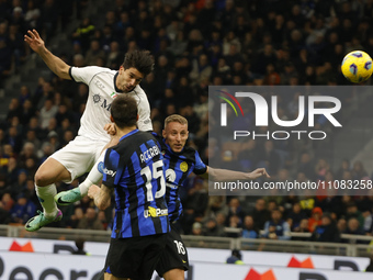 Giovanni Simeone of Napoli is heading the ball during the Serie A soccer match between Inter FC and SSC Napoli at Stadio Meazza in Milan, It...