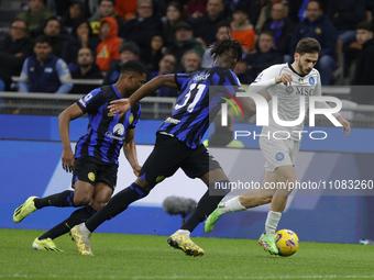 Khvicha Kvaratskhelia of Napoli is controlling the ball during the Serie A soccer match between Inter FC and SSC Napoli at Stadio Meazza in...